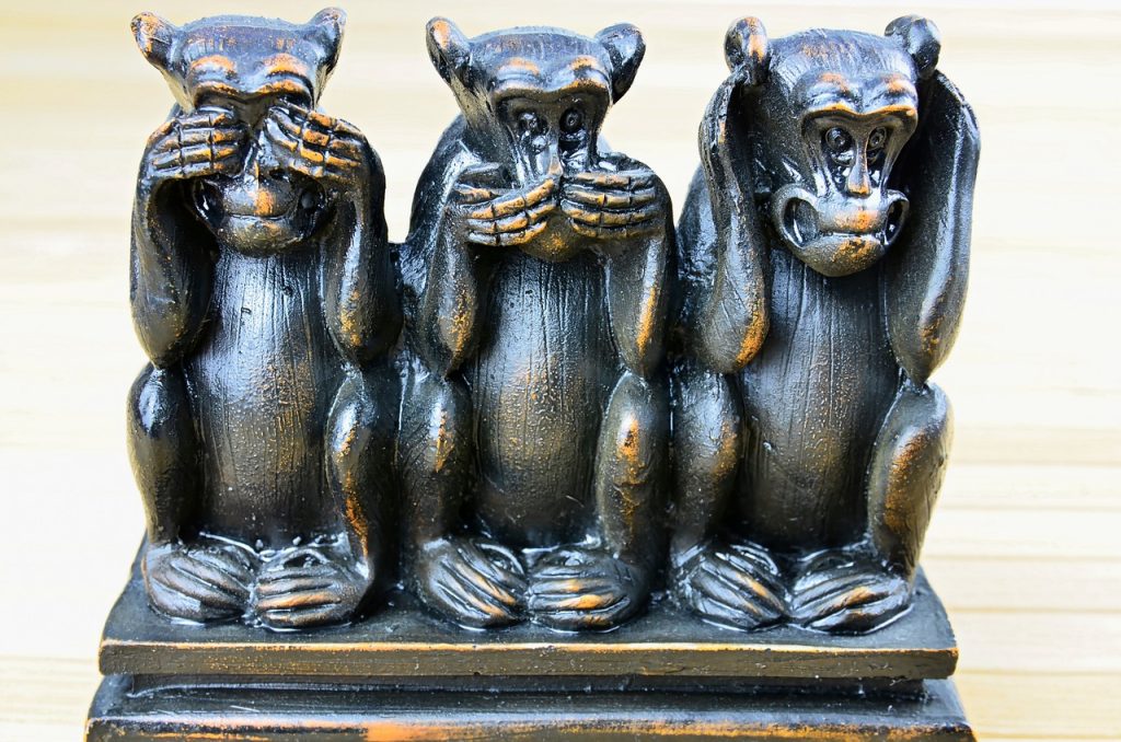 Three monkeys statue